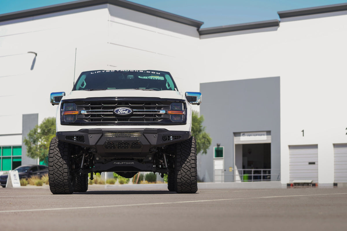 Full image of the 2024 Ford F-150 HoneyBadger Front Bumper installed